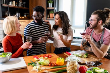 happy friends having dinner together