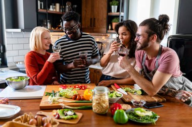 happy friends having dinner together