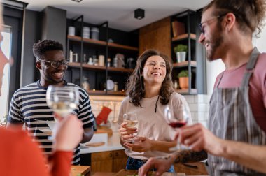happy friends having dinner together