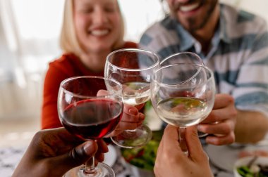 happy friends having dinner together