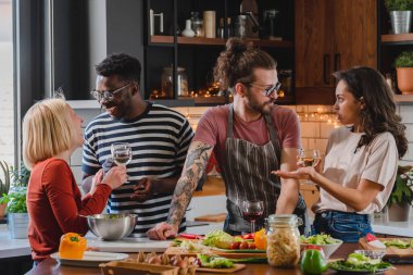 happy friends having dinner together