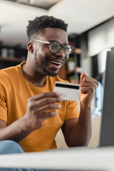 stock image african american man making online order