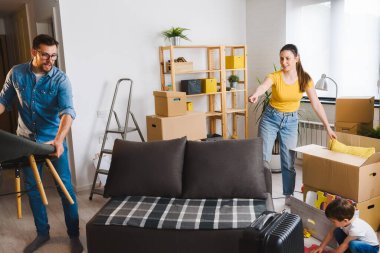 family moving into new apartment