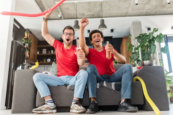 stock image men friends watching football