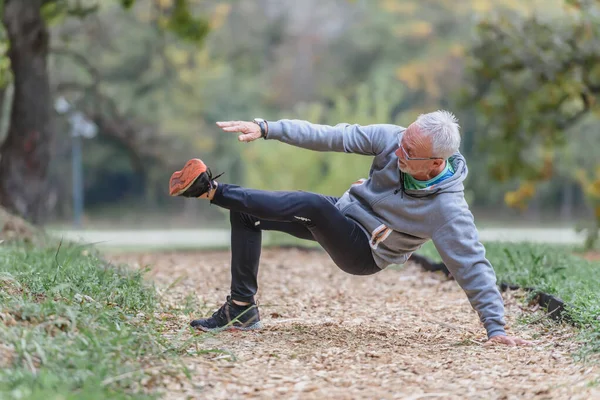 Senior Man Doing Exercises Outdoors — Stock Photo, Image