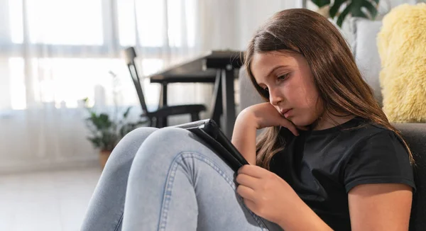 stock image cute little girl using tablet