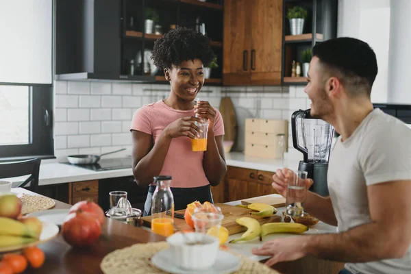 stock image young couple having breakfast together at kitchen 