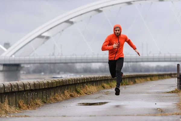 stock image young man running in the city 