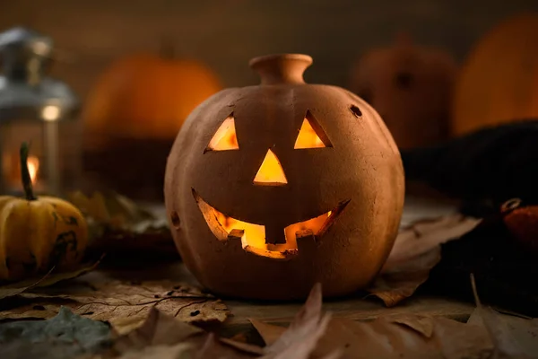 halloween pumpkin jack lantern with burning candle