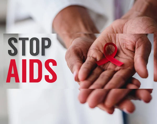 Red Ribbon Aids Awareness Doctors Hands — Stock Photo, Image