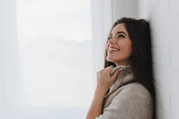 stock image young beautiful pregnant woman posing near window