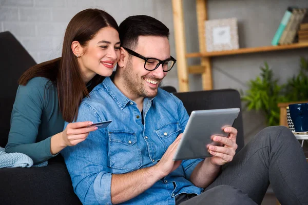 stock image happy couple making online order at home, shopping concept