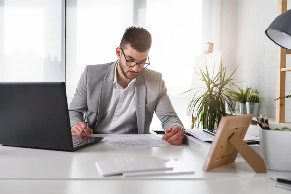 stock image businessman working in the office.