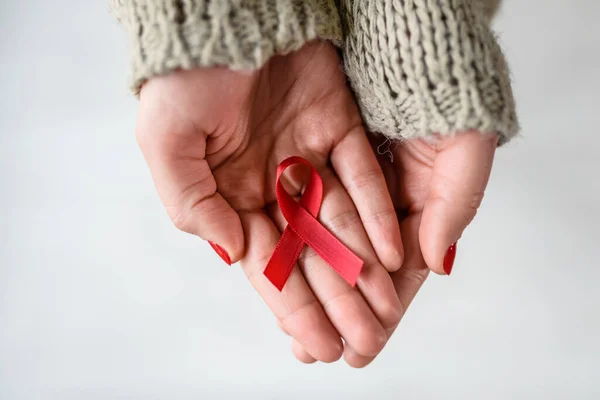 Red Aids Awareness Ribbon Hands — Stock Photo, Image
