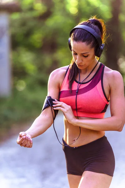 stock image Young fitness woman jogging in the park