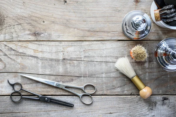 stock image set of barber tools on wooden background