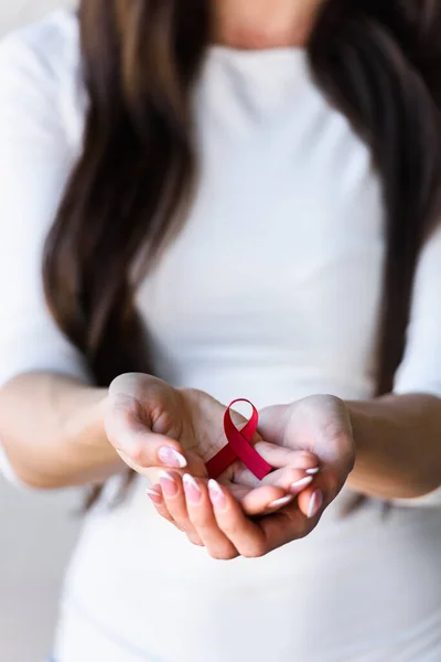 Woman Holding Red Ribbon Aids Awareness Symbol — Stock Photo, Image