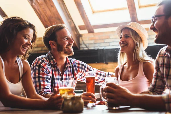 stock image friends drinking beer in restaurant 