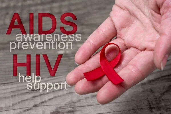 Red Ribbon Hand Awareness Support People Living Hiv — Stock Photo, Image
