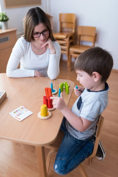 Proud Mother Looking Her Son Playing Didactic Games Learning — Stock Photo, Image