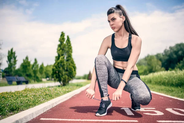 stock image athletic female athlete runner on stadium track