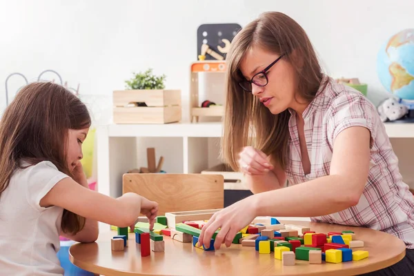 Mother Looking Her Child Playing Toy Building Blocks Stock Picture