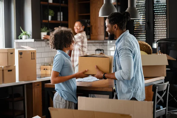 stock image african american family moving in new home 