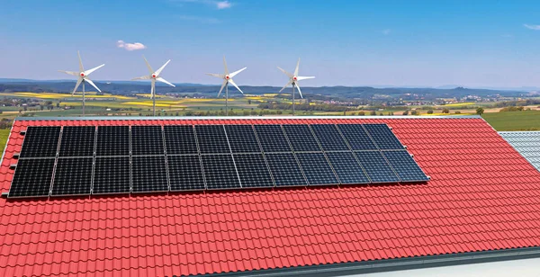 small wind turbines and solar power panels on the roof of a private house, 3D Illustration