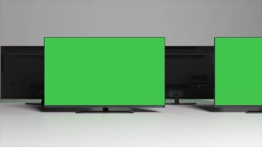 Green background. TV screens with chrome key. Infinite scroll left. Empty space to insert. 3d animation. High quality 4k footage
