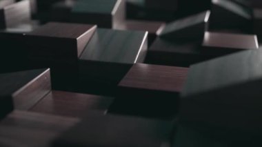  Wooden cube figures move up and down. Abstraction. Dark wood. Chaotic movement. Straight and beveled top figures. High quality 4k footage