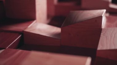 Wooden rectangles move up and down. Pillars. Sanded wooden blocks. Red color. Steps. 3d animation. High quality 4k footage