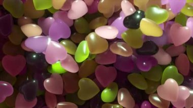 Love concept. Lots of green purple stones in the shape of a heart. The neon heart pushes the rest. 3d animation. High quality 4k footage