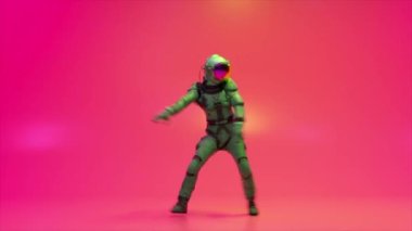 An astronaut in a space suit is dancing on a bright pink background. 3d animation of a seamless loop. High quality 4k footage