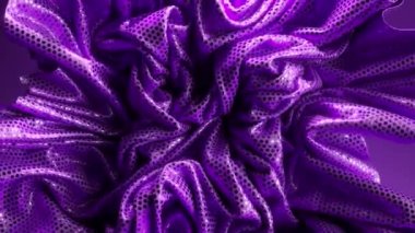 Cryptocurrency concept. The crumpled purple shiny fabric is straightened out and the bitcoin is opened. 3d animation. High quality 4k footage