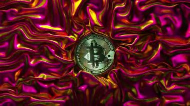 A fabric of metallic neon pink is wrinkled around the bitcoin. Shiny fabric. Cryptocurrency. Silk. Creases in fabric. Drapery. High quality 4k footage