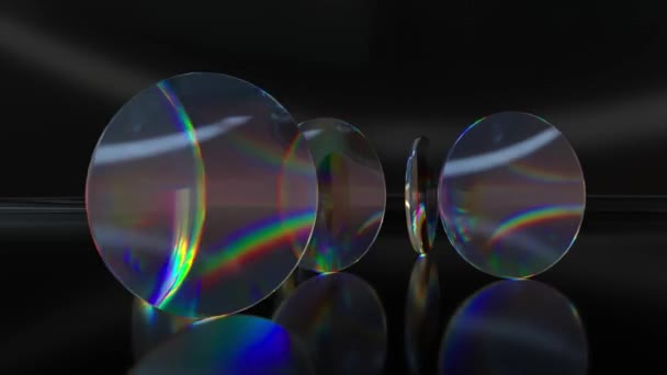 色彩斑斓的半透明玻璃镜片在深色背景下旋转和旋转 无缝循环3D动画 — 图库视频影像