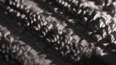  Hareket eden gri bir yüzey şekil değiştirir. Gölge. Dönüşüm. El salla. Kusursuz bir döngünün 3 boyutlu animasyonu.