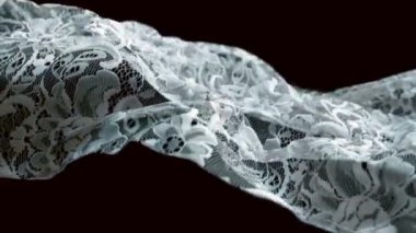 Beyaz dalgalı saten tülün arka planı. Çiçek desenli dalgalı kumaş, rüzgarda dalgalanıyor. Şefkat ve hafiflik. Siyah arkaplanda 3B dijital canlandırma.