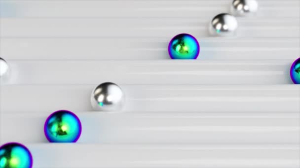 光滑的三维动画 金属和闪光的球体在光滑的 凹凸不平的白色表面上滑行 — 图库视频影像