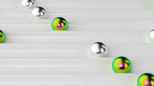 光滑的三维动画 金属和闪光的球体在光滑的 凹凸不平的白色表面上滑行 — 图库视频影像