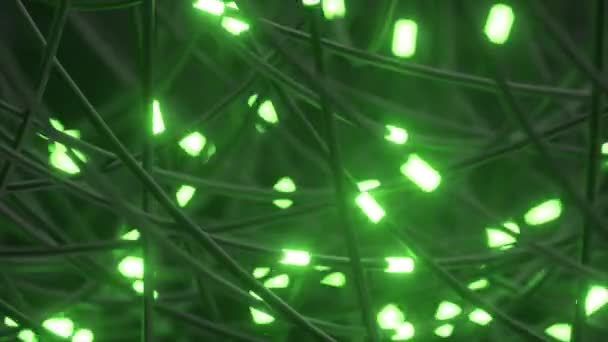 複雑なデジタルシステムを示唆する 輝く緑色のノードを持つ結ばれたワイヤーのネットワーク — ストック動画