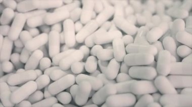 Sonsuz üç boyutlu animasyonda beyaz kapsüller.