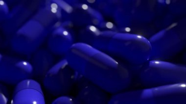Dramatik ışıklandırmalı mavi 3D kapsüller yığını.