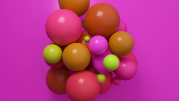 一丛簇色彩艳丽的球体在温暖的色调中创造出一个愉快的3D构图 — 图库视频影像