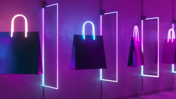 Linea Borse Shopping Illuminate Neon Sullo Sfondo Viola — Video Stock