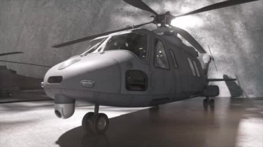 Endüstriyel bir hangarda konuşlanmış askeri bir helikopterin engebeli tasarımını ve gelişmiş ekipmanlarını gösteren yakın plan bir görüntüsü..