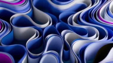 Renkli kağıt şeritler dinamik bir şekilde dalgalanıyor, kusursuz soyut hareketli grafik animasyonlarında büyüleyici dalgalı desenler yaratıyor. 3d canlandırma