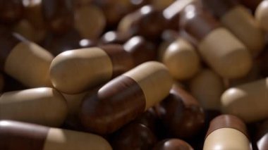 Tıbbi ahşap kapsüller nazikçe yığılmış ilaç haplarının üzerinde dönüyor, karmaşık ahşap dokusunu ve yumuşak klinik ışıklandırmayla nötr arka plana karşı pürüzsüz yüzeyi ortaya çıkarıyor.