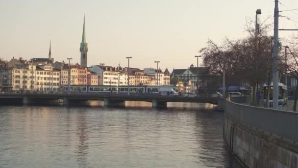 Tram Passing Limmat River Bridge Zurichs Old Town Sunset High — Stock Video
