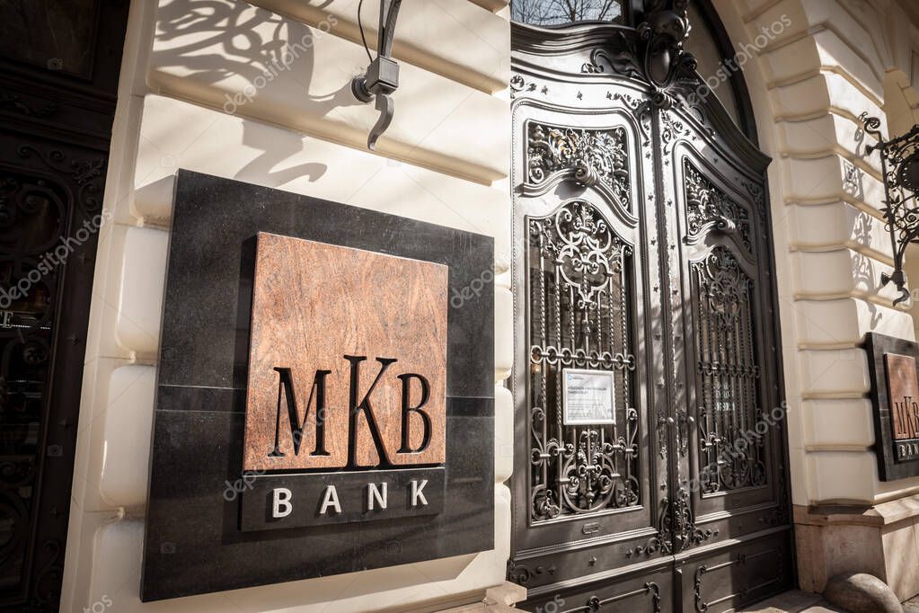 BUDAPEST, HUNGARY - FEBRUARY 26, 2022: MKB Bank logo on their main office for Budapest in the city center. MKB is one of the biggest domestics banks of Hungary